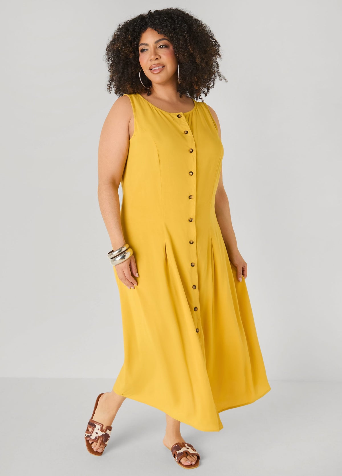 Vestido camisero plisado de tejido maxi