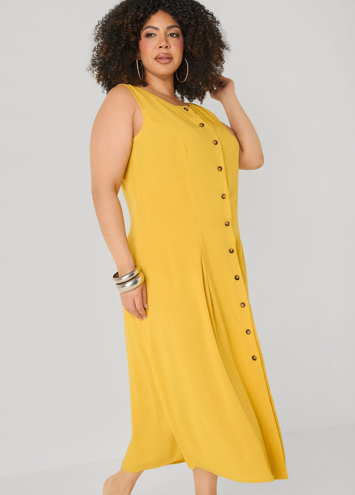 Vestido camisero plisado de tejido maxi