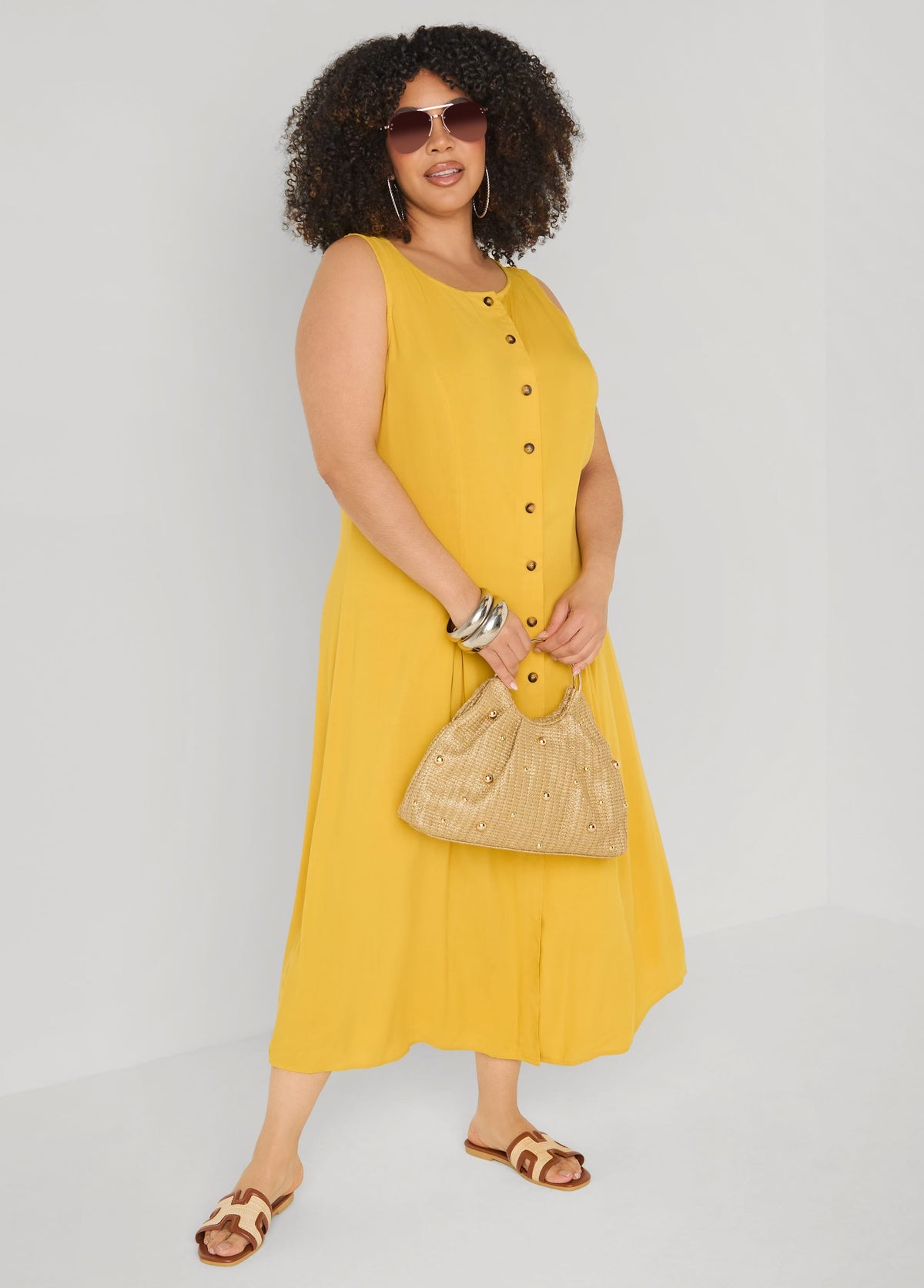 Vestido camisero plisado de tejido maxi