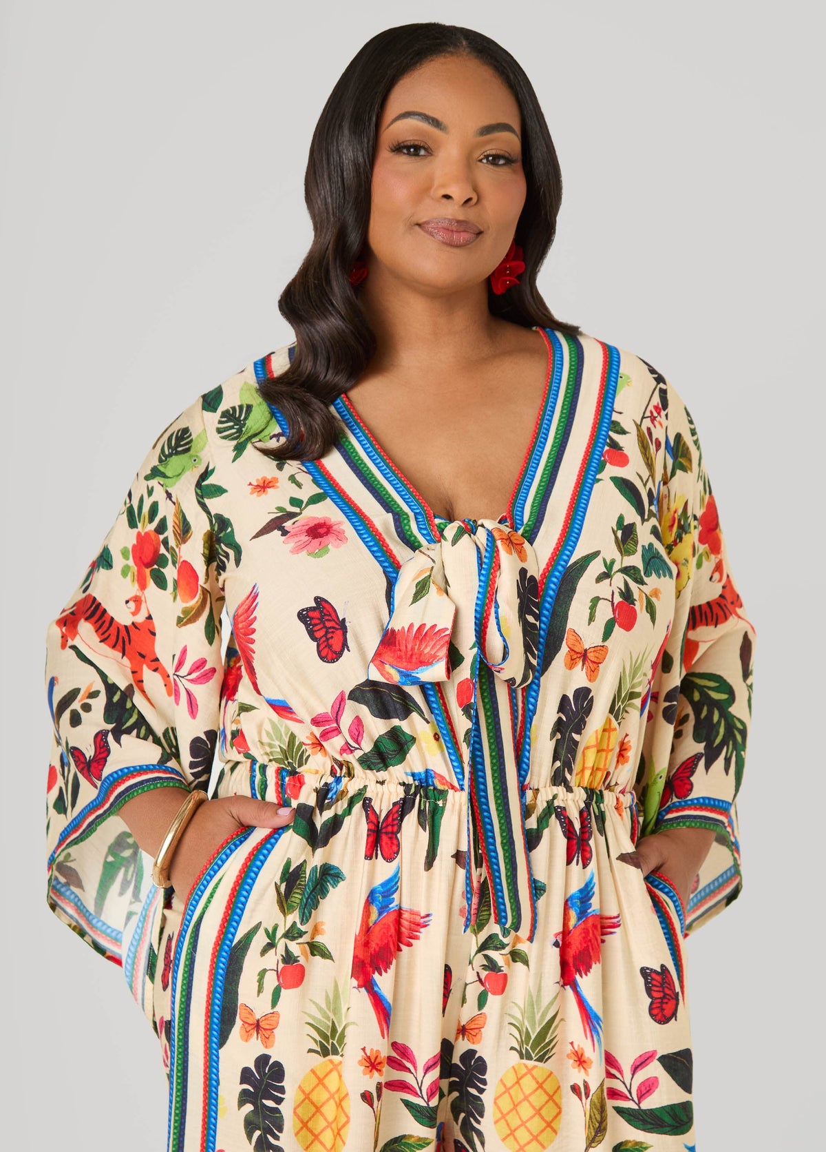 Mono estampado tropical con lazo al frente