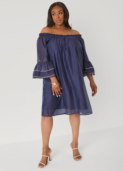 Vestido bordado con hombros descubiertos