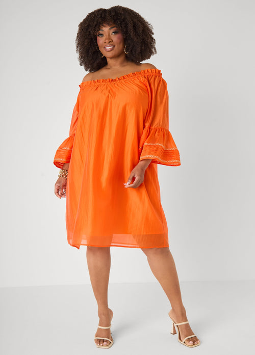 Vestido bordado con hombros descubiertos